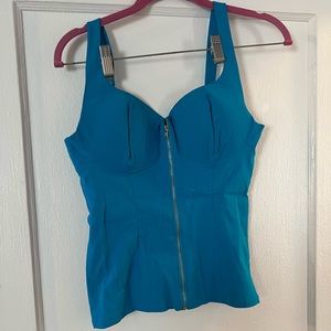 Blue corset top with zipper and open back detail